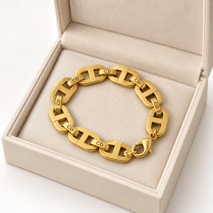 muted gold bracelet in open ivory box