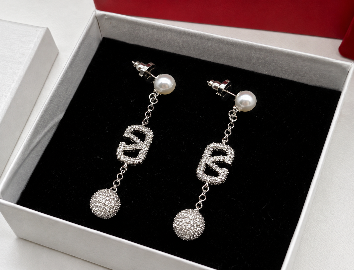 silver earrings in a velvet gift box silver earrings in a velvet gift box